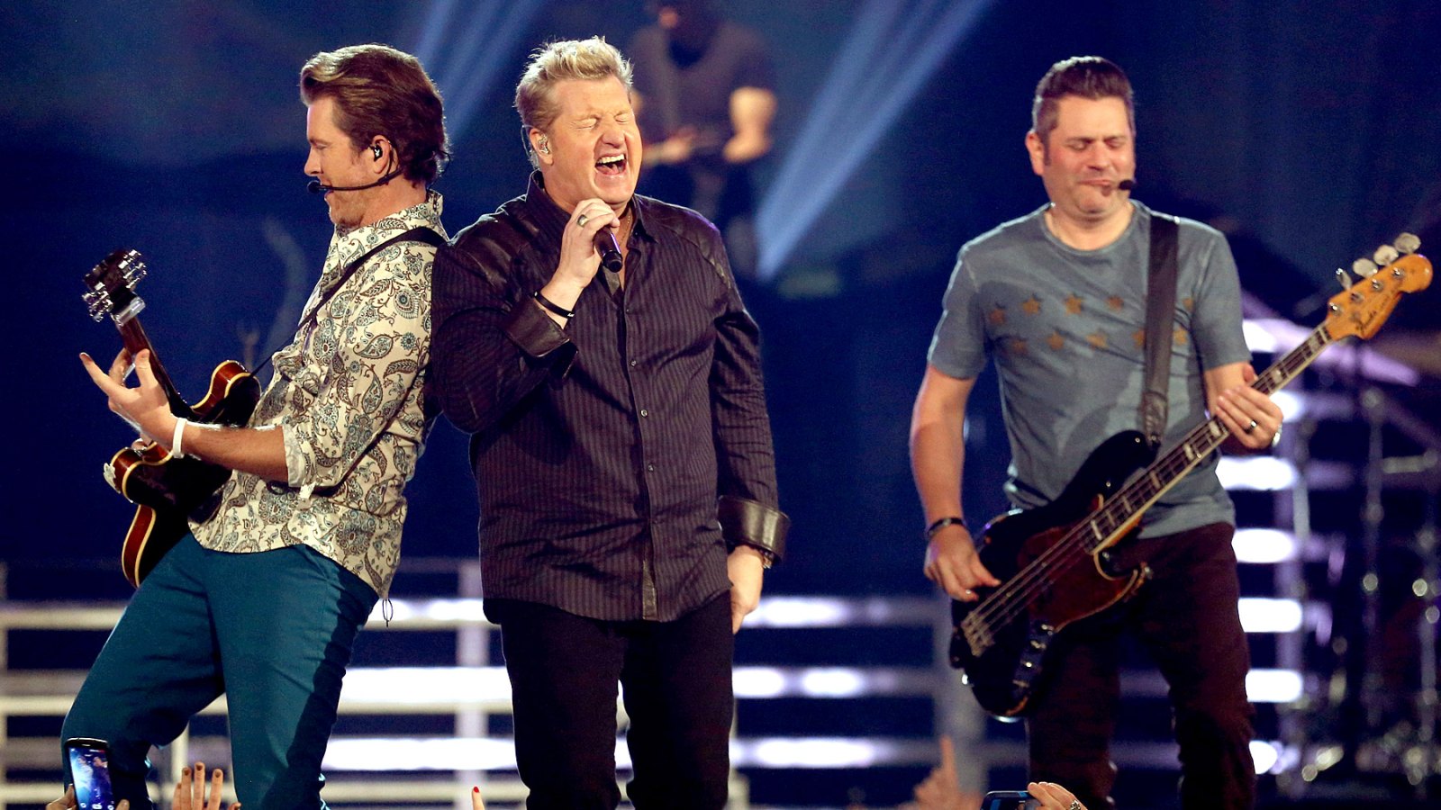 Rascal Flatts perform onstage during the 49th Annual ACM Awards