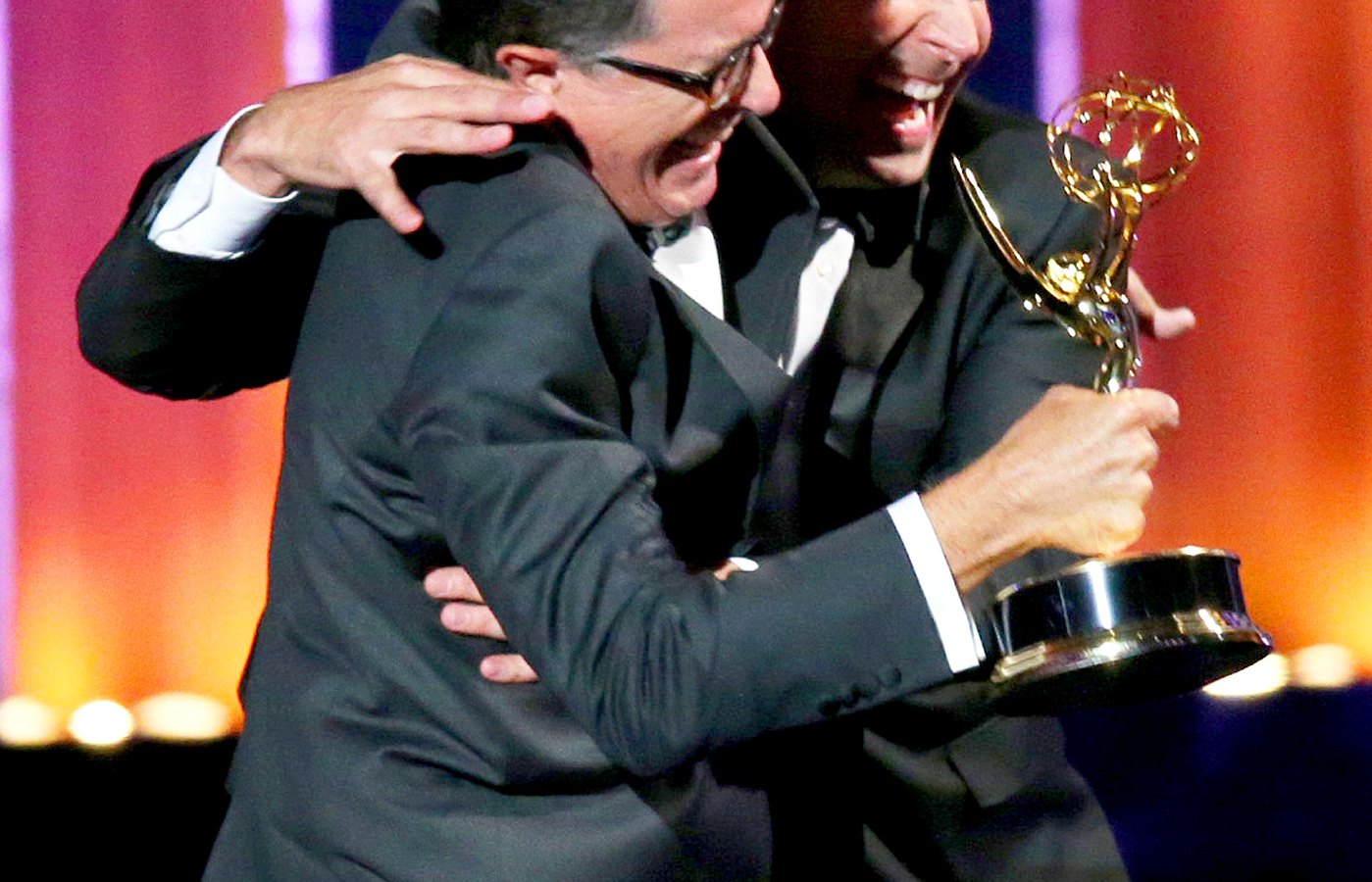 Stephen Colbert and Jimmy Fallon on stage during the 66th Emmy Awards