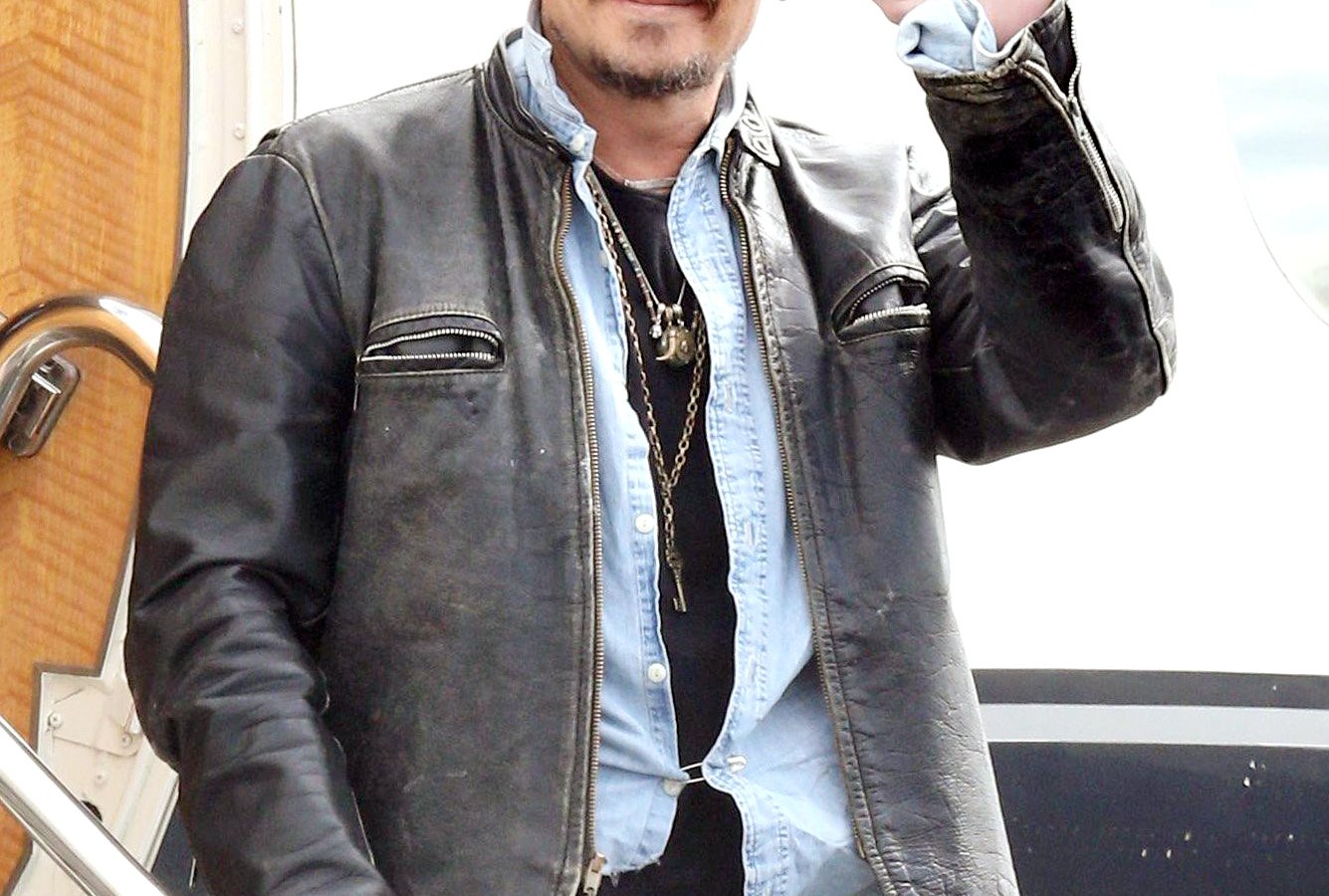 Johnny Depp arrives at Brisbane Airport, Australia on April 21, 2015.