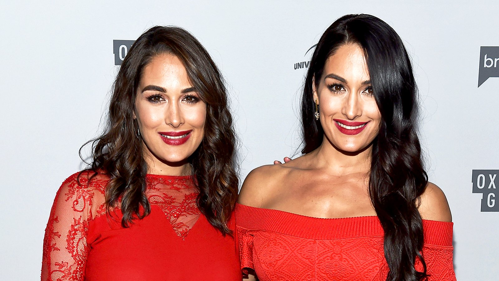Brie Bella and Nikki Bella arrive at NBCUniversal's Press Junket at Beauty & Essex on November 13, 2017 in Los Angeles, California.