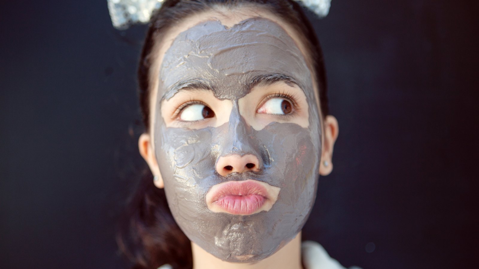 teen with chocolate facial beauty mask