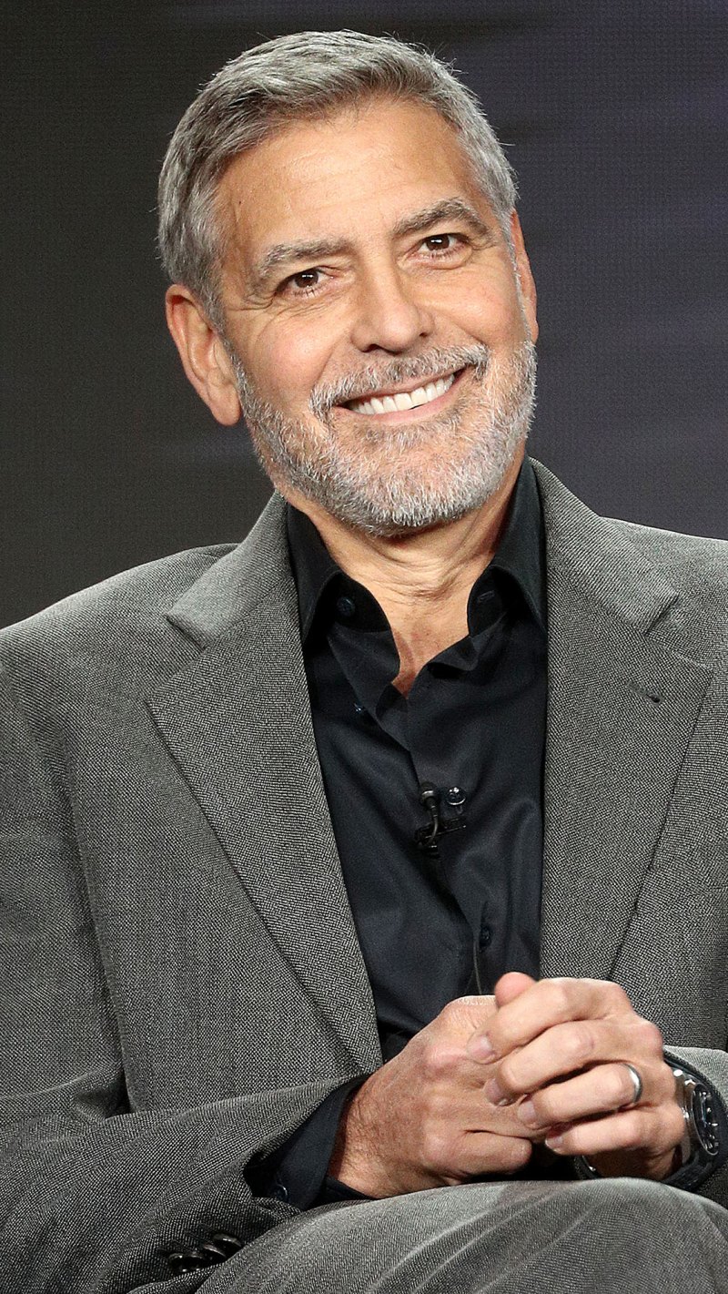George Clooney Smiling at the Camera in Gray suit