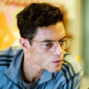 Rami Malek, Caitriona Balfe in The Amateur