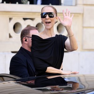 PARIS, FRANCE - SEPTEMBER 23: Celine Dion waves at her fans in front of the Royal Monceau Hotel on September 23, 2026 in Paris, France. (Photo by Marc Piasecki/GC Images)