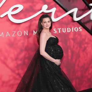 Pregnant Anne Hathaway Shows Off Her Growing Baby Bump in a Black Beaded Dress at ‘Verity’ Premiere