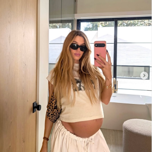 Pregnant Alex Cooper Shows Off Her Growing Baby Bump