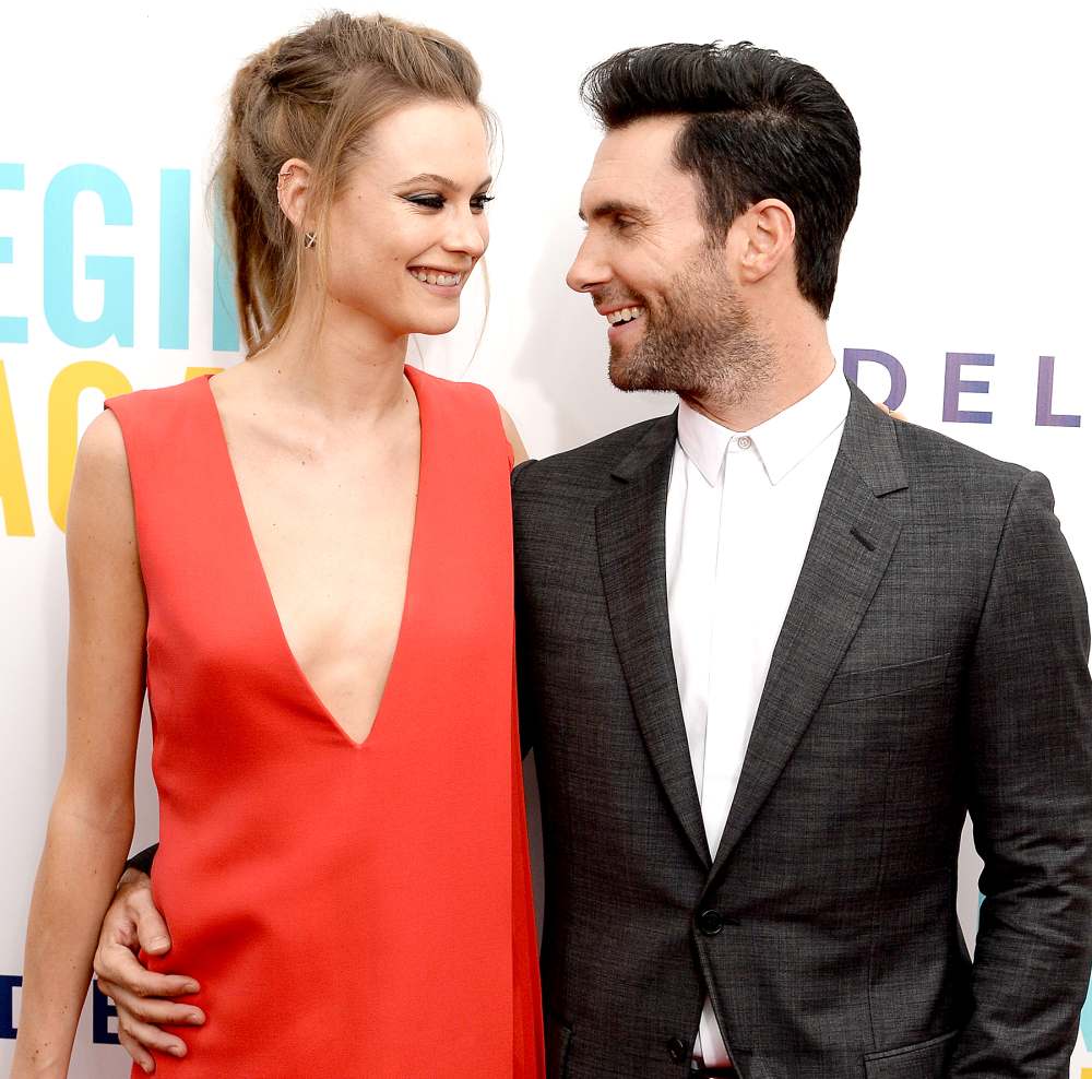 Behati Prinsloo and Adam Levine attend the