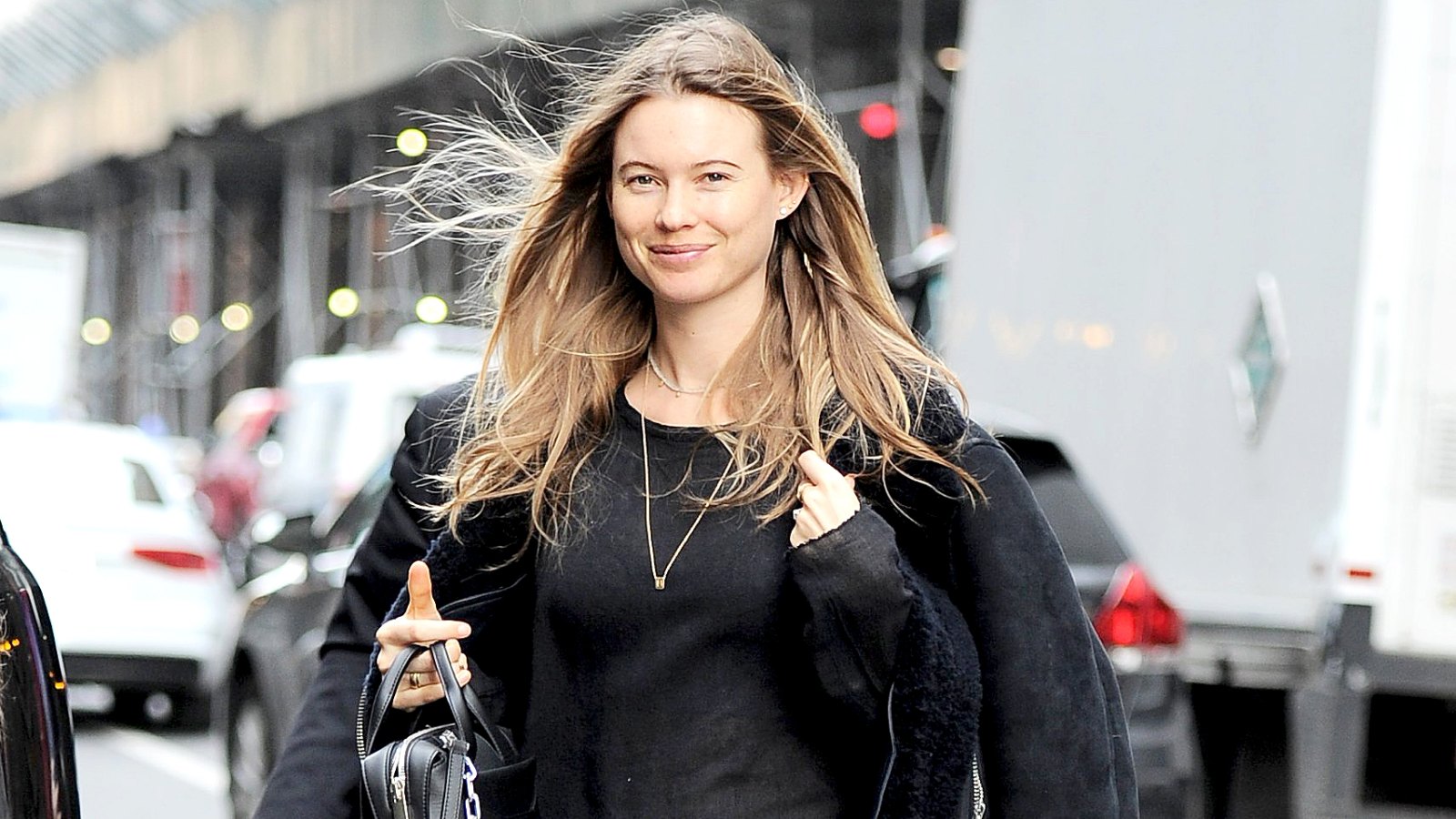 Behati Prinsloo is all smiles as she steps out to head to Dujour magazine event in NYC on March 23, 2016.
