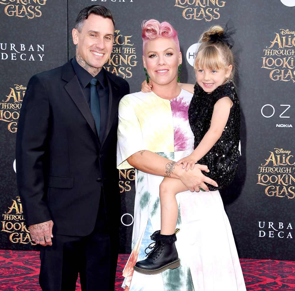 Carey Hart, Pink and Willow Sage Hart arrive at the premiere of Disney's 'Alice Through The Looking Glass' at the El Capitan Theatre on May 23, 2016 in Hollywood, California.