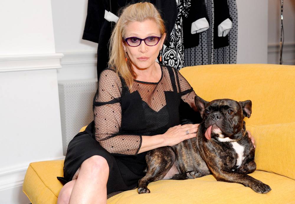 Carrie Fisher attends Marina Rinaldi launch of new atelier on July 3, 2014 in London, England.