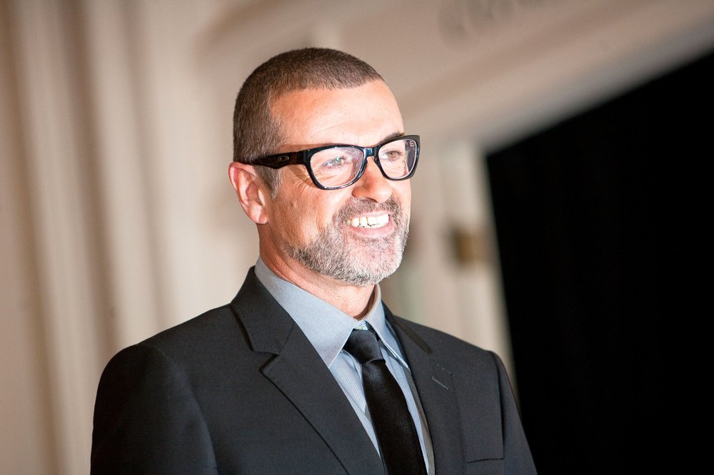 George Michael poses for photos before announcing his "Symphonica" European Orchestral tour during a press conference at the Royal Opera House on May 11, 2011 in London, United Kingdom.