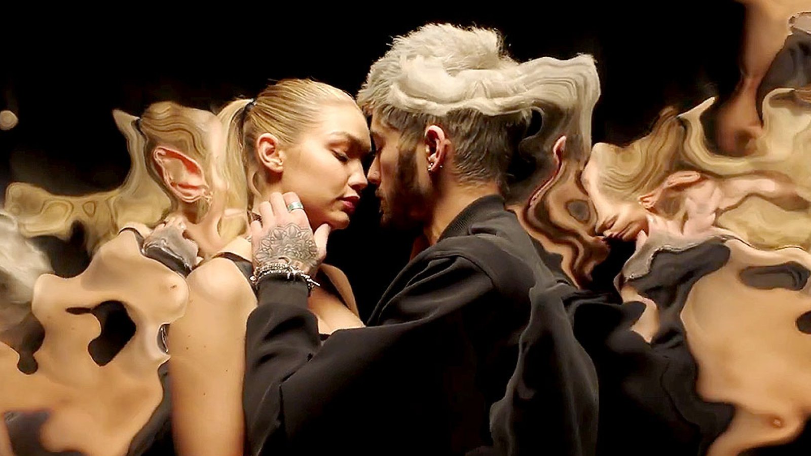 Gigi Hadid and Zayn Malik make out in the new video for 'Pillowtalk.'