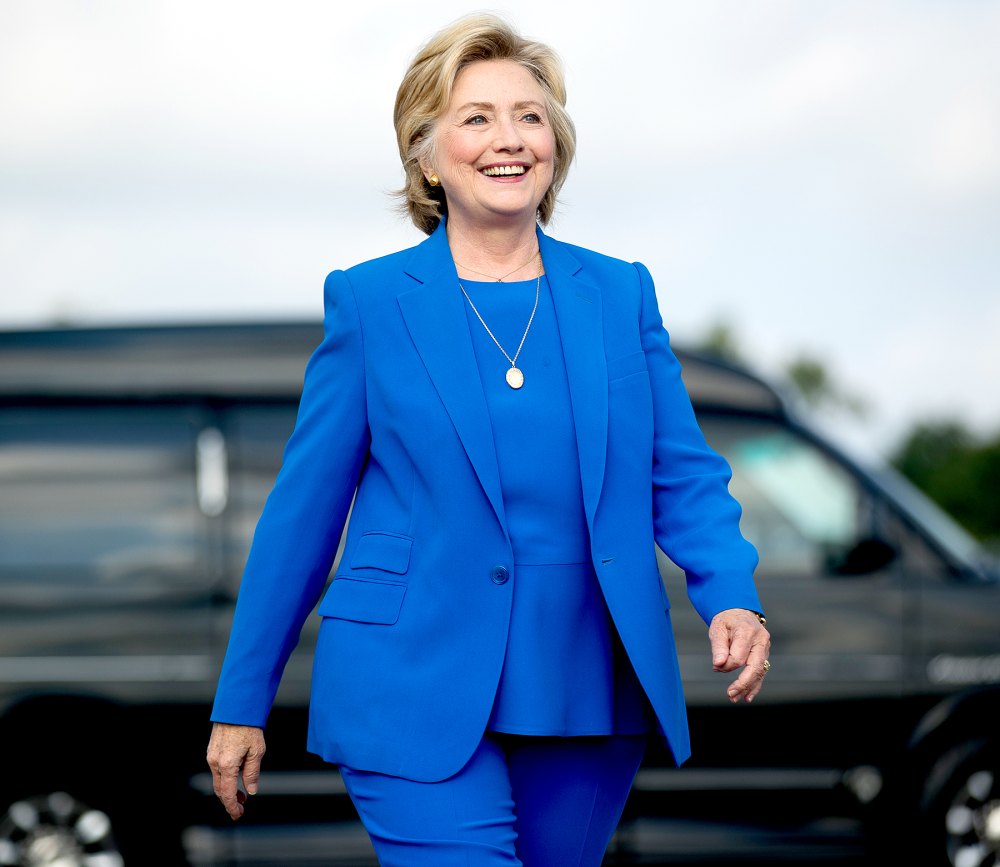 Democratic presidential candidate Hillary Clinton arrives to speak to members of the media before boarding her campaign plane at Westchester County Airport in White Plains, N.Y., Thursday, Sept. 8, 2016, to travel to Charlotte, N.C., to attend a campaign rally.