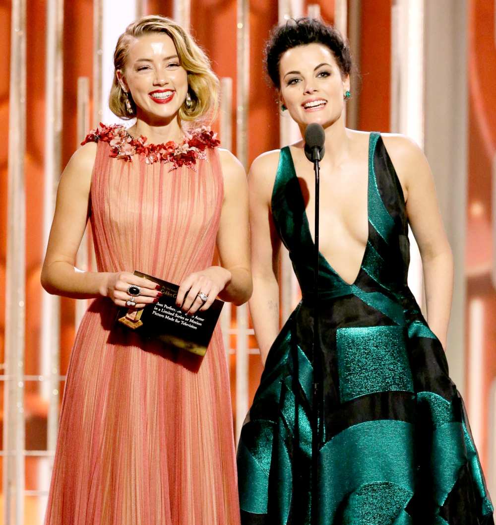 Amber Heard and Jaimie Alexander onstage during the 73rd Annual Golden Globe Awards.