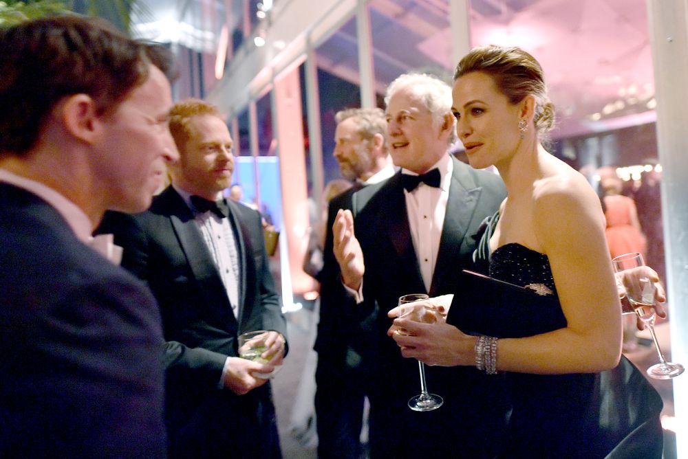 Jesse Tyler Ferguson, Victor Garber and Jennifer Garner attend the 2016 Vanity Fair Oscar Party.