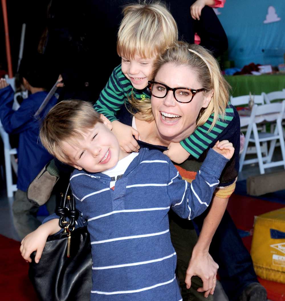 Julie Bowen and sons attend a creative arts fair and family day.