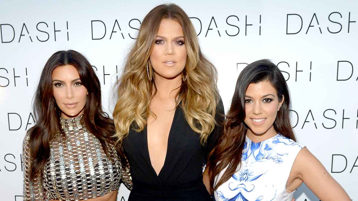 Kim Kardashian, Khloe Kardashian and Kourtney Kardashian attend the Grand Opening of DASH Miami Beach at Dash Miami Beach on March 12, 2014 in Miami Beach, Florida.