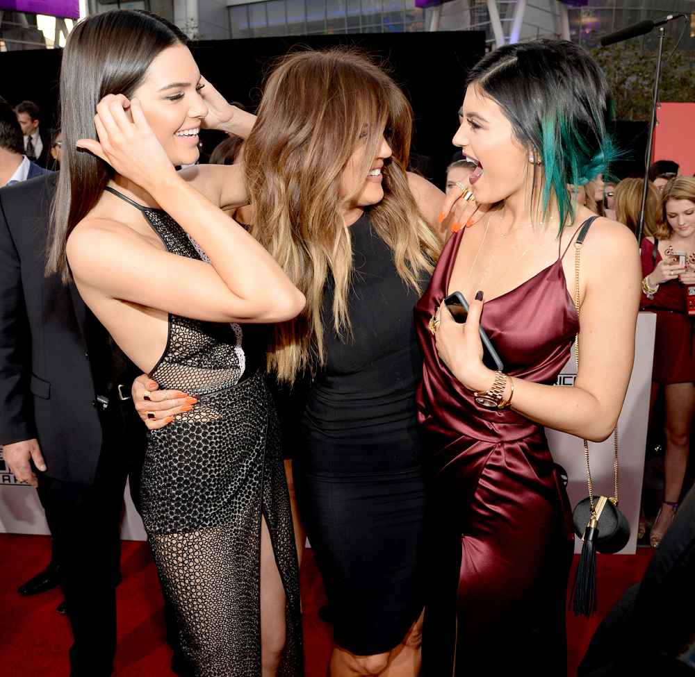 Kendall Jenner, Khloe Kardashian and Kylie Jenner attend the 2014 American Music Awards.