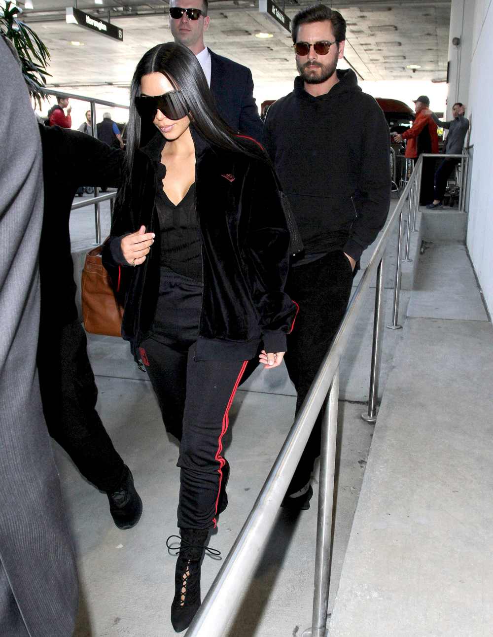 Kim Kardashian at LAX with Scott Disick.