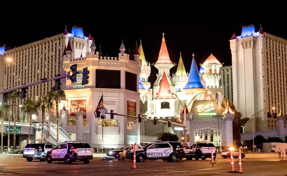 Police block the roads leading to the Mandalay Hotel (background) after a gunman attack in Las Vegas, NV, United States on October 02, 2017.