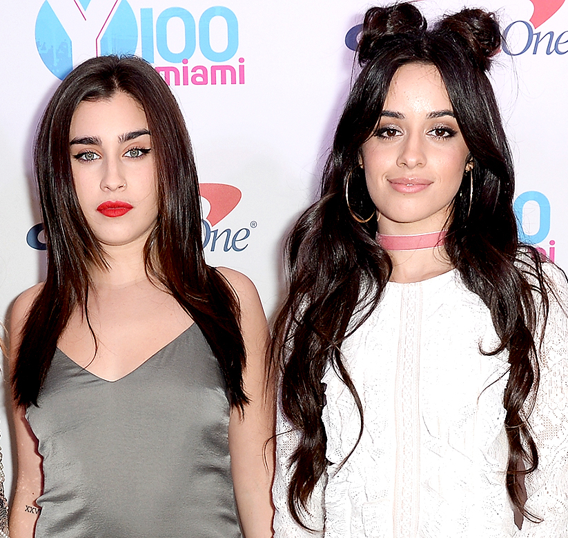 Lauren Jauregui and Camila Cabello of Fifth Harmony attend the Y100's Jingle Ball 2016 - PRESS ROOM at BB&T Center on December 18, 2016 in Sunrise, Florida.