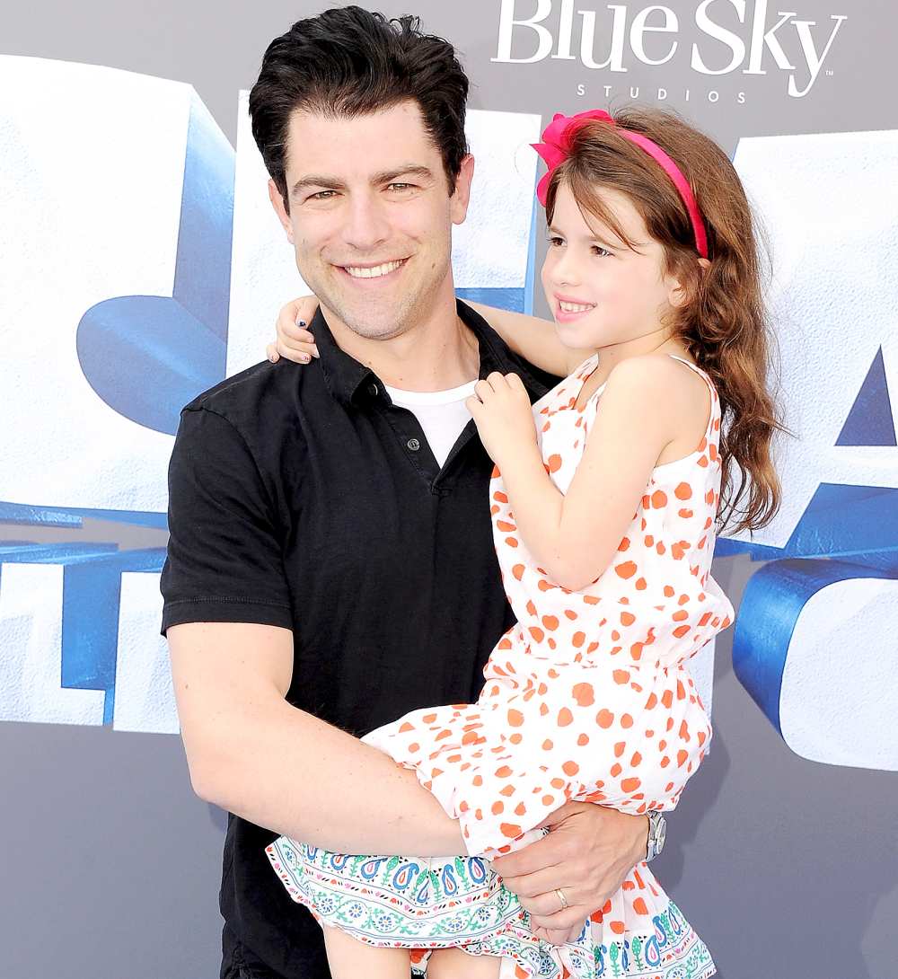 Max Greenfield and daughter Lilly Greenfield arrive at the screening Of "Ice Age: Collision Course" at Zanuck Theater at 20th Century Fox Lot on July 16, 2016 in Los Angeles, California.