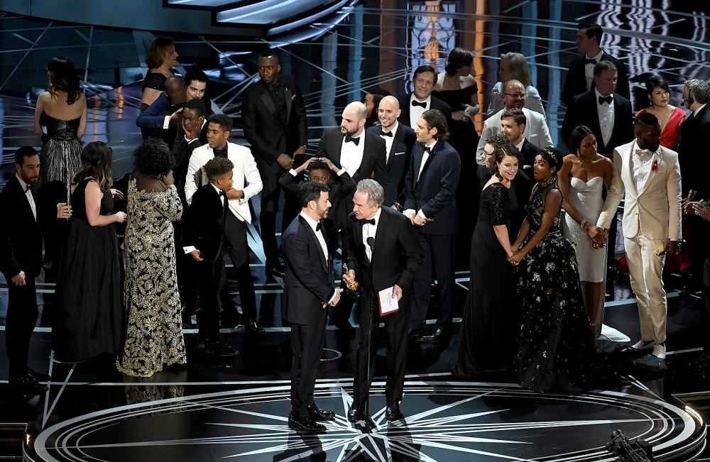 Actor Warren Beatty (R) explains a presentation error which resulted in Best Picture being announced as 'La La Land' instead of 'Moonlight' with host Jimmy Kimmel onstage during the 89th Annual Academy Awards at Hollywood & Highland Center on February 26, 2017 in Hollywood, California.