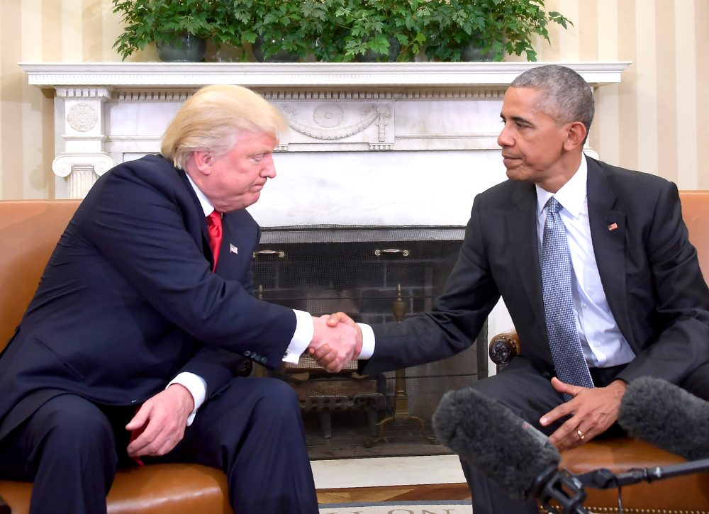US President Barack Obama shakes hands as he meets with Republican President-elect Donald Trump on transition planning in the Oval Office at the White House on November 10, 2016 in Washington,DC.