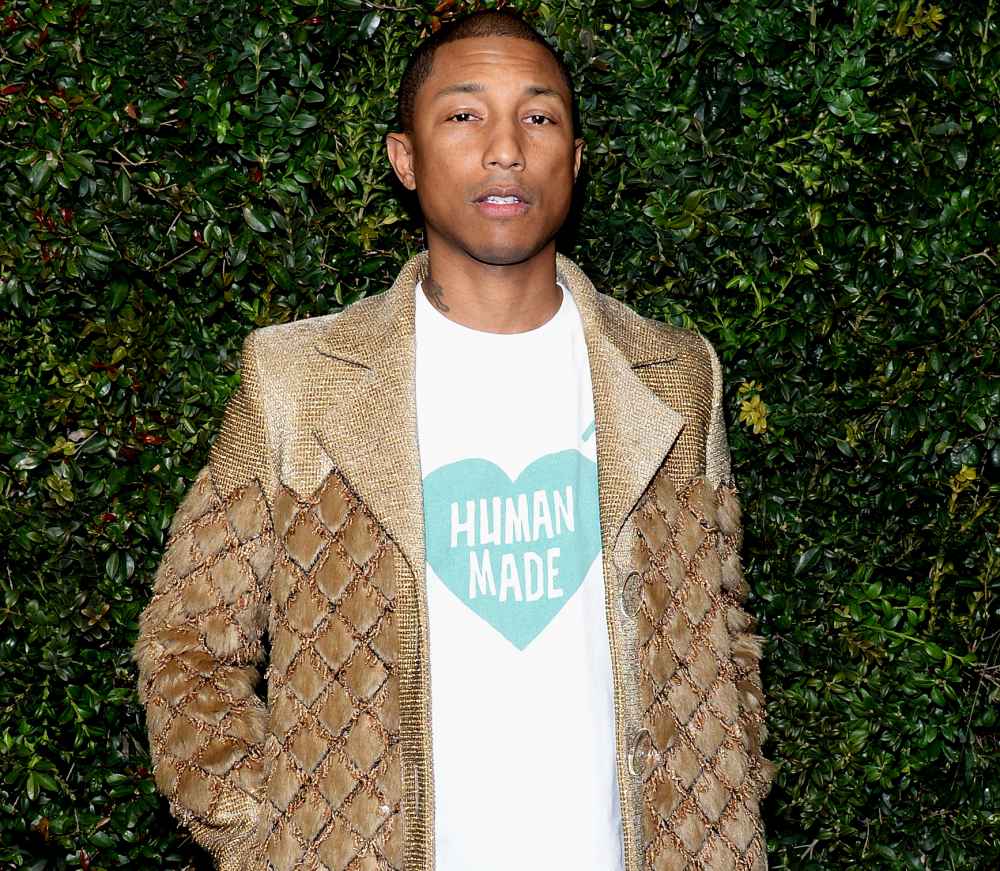 CHANEL Ambassador Pharrell Williams, wearing CHANEL, attends the Charles Finch and CHANEL Pre-Oscar Awards Dinner at Madeo Restaurant on February 25, 2017 in Beverly Hills, California.