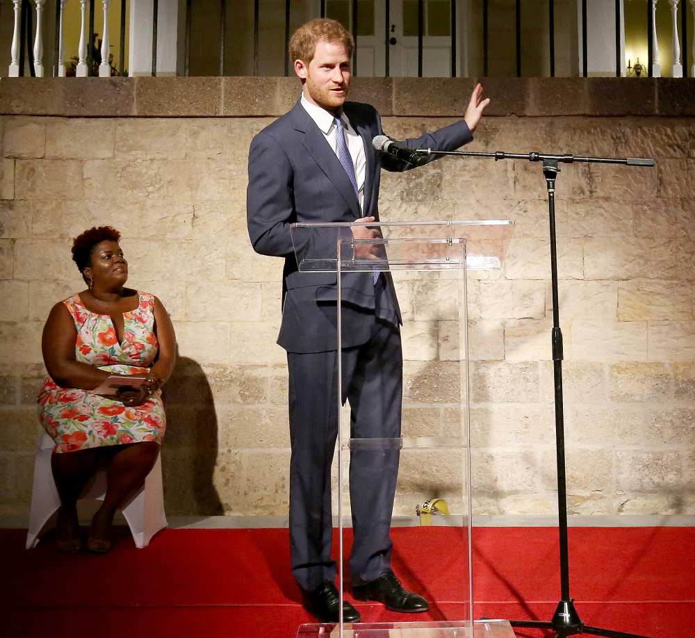 Prince Harry delivers a speech during a welcome reception hosted by the Governor General, Sir Rodney Williams, at the newly renovated Clarence House on the first day of an official visit, on Nov. 20, 2016, in Antigua.