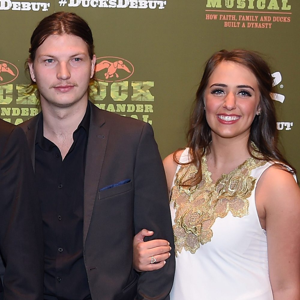 Reed Robertson and his girlfriend Brighton Thompson attend the