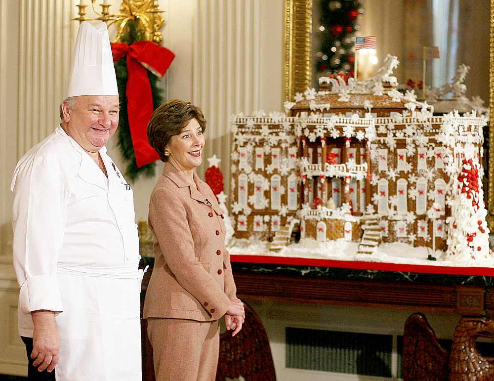 US First lady Laura Bush stands with Guest Pastry Chef Roland Mesnier in 2006.