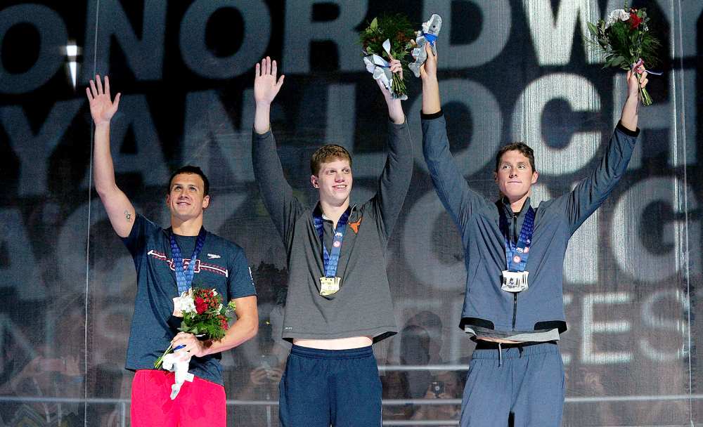 Ryan Lochte, Townley Haas and Conor Dwyer (from left) of the United States participate in the award ceremony for the Men's 200 Meter Freestyle during Day 3 of the 2016 U.S. Olympic Team Swimming Trials at CenturyLink Center on June 28, 2016, in Omaha, NB.