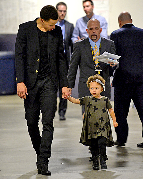 Riley and Stephen Curry (walking)