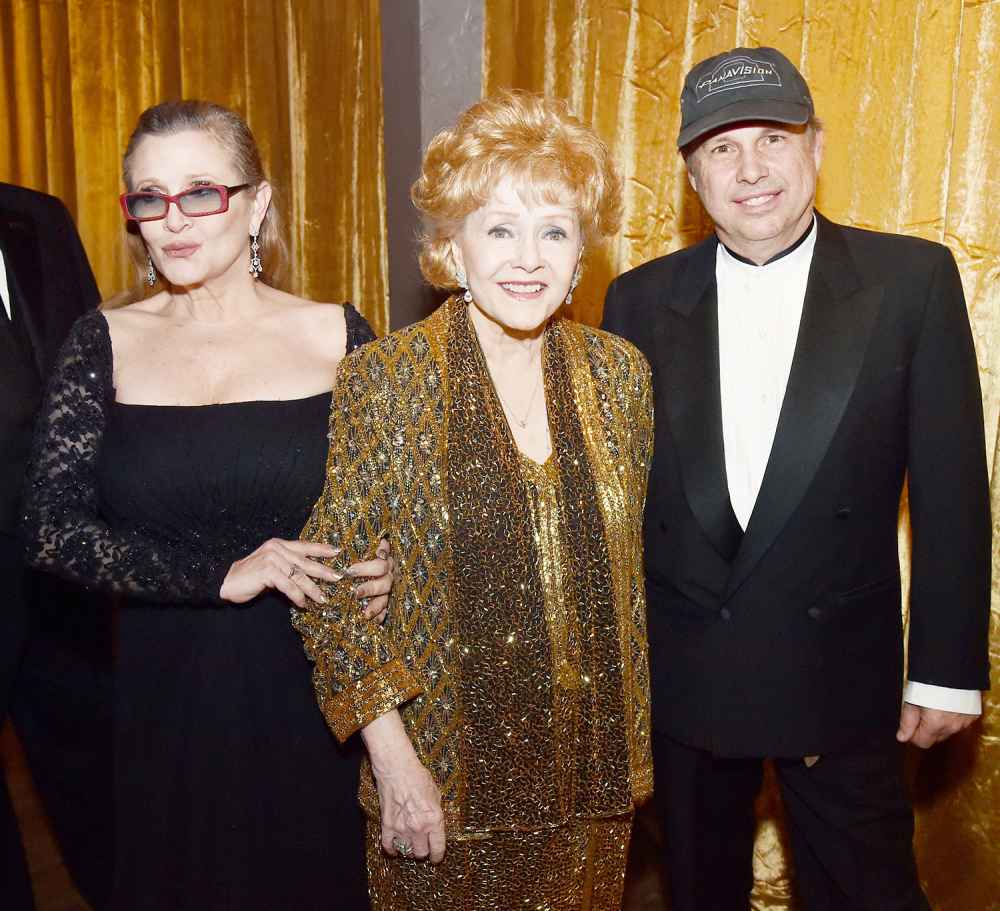 Carrie Fisher, Debbie Reynolds and Todd Fisher at TNT's 21st Annual Screen Actors Guild Awards on Jan. 25, 2015, in Los Angeles.
