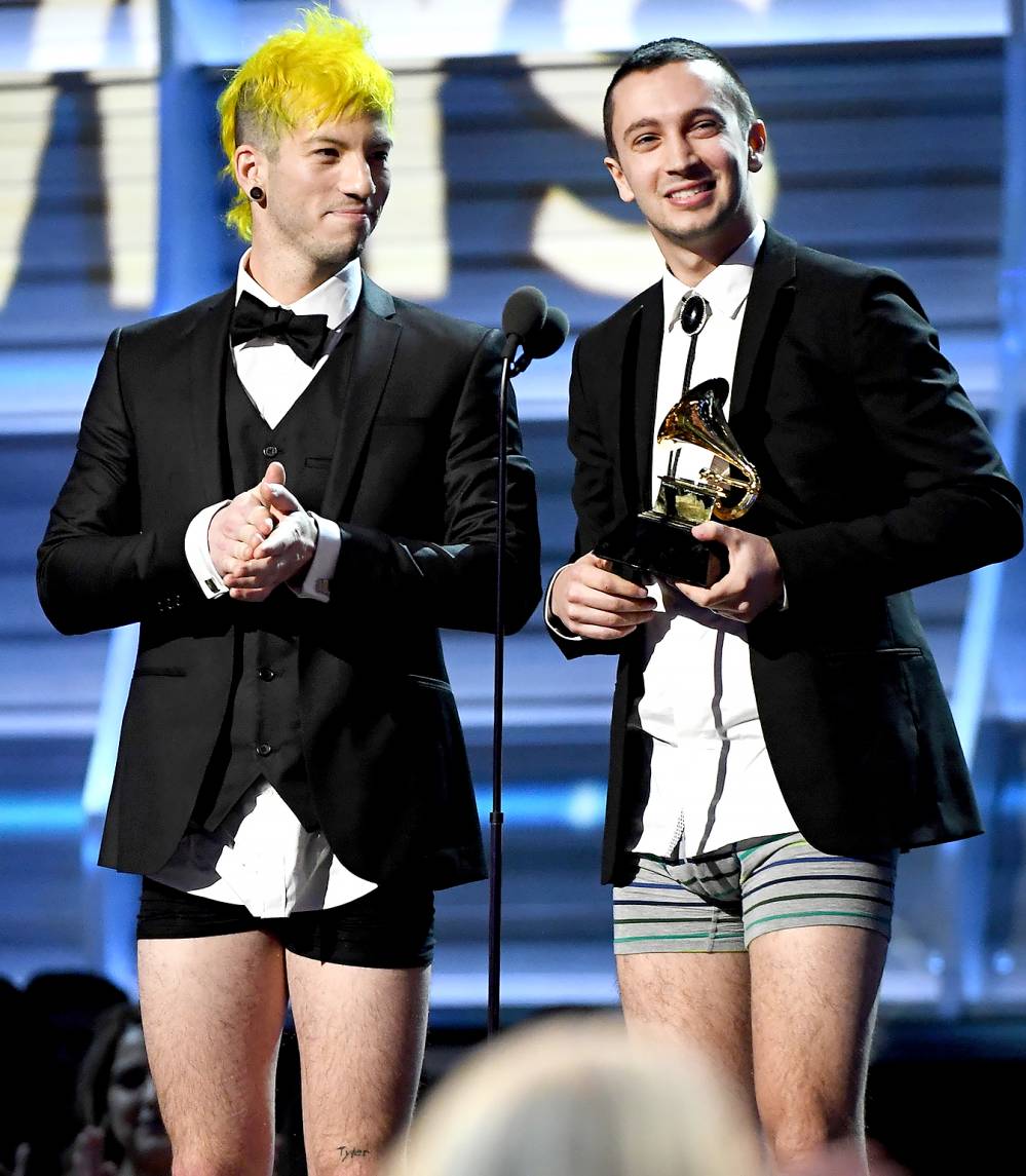 Josh Dun (L) and Tyler Joseph of Twenty One Pilots, accept the award for Best Pop Duo/Group Performance, onstage during The 59th GRAMMY Awards at STAPLES Center on February 12, 2017 in Los Angeles, California.