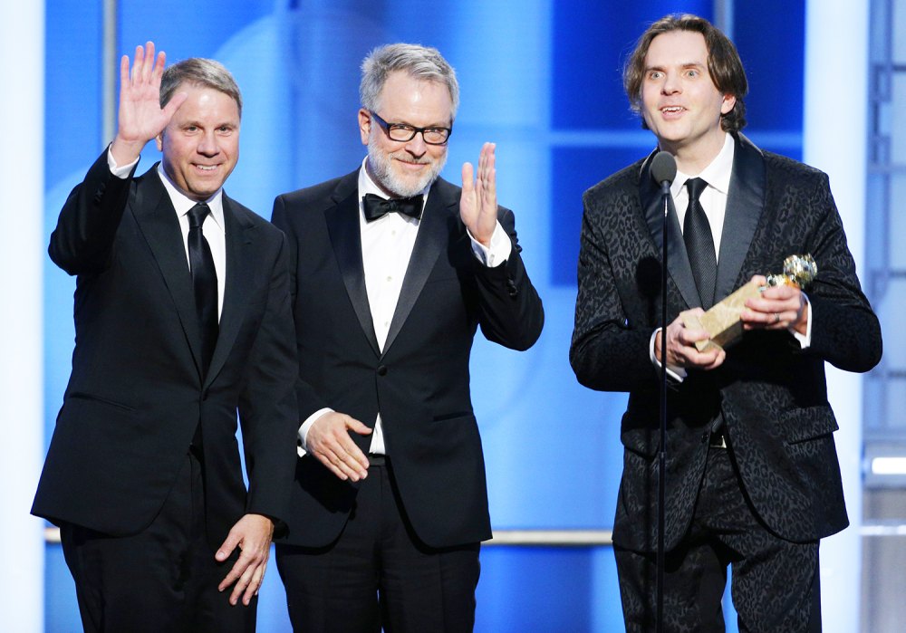 Clark Spencer and directors Rich Moore and Byron Howard accept the award for Best Motion Picture - Animated for