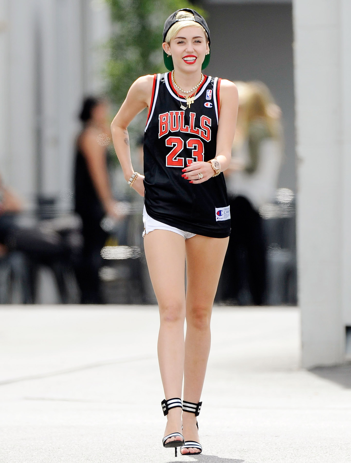 Miley Cyrus Sexy Outfit: Singer Wears Jersey, Short Shorts, High Heels