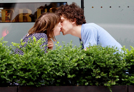 Mia Wasikoswka and Jesse Eisenberg kissed at a cafe in Toronto.