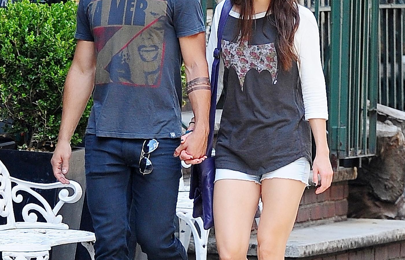 Taylor Lautner and Marie Avgeropoulos in New York on July 29, 2013