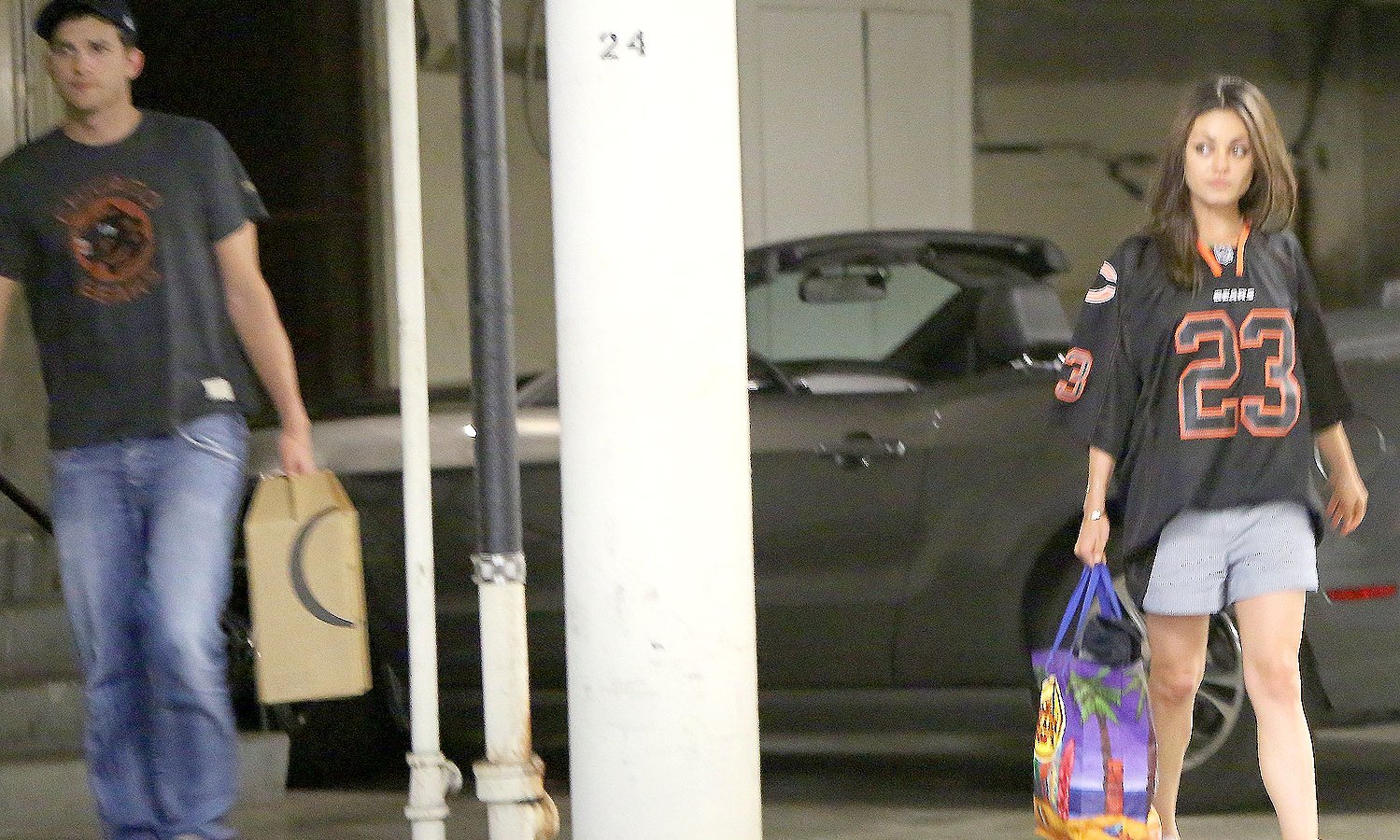 Ashton Kutcher and Mila Kunis in Hollywood on Sept 15, 2013.