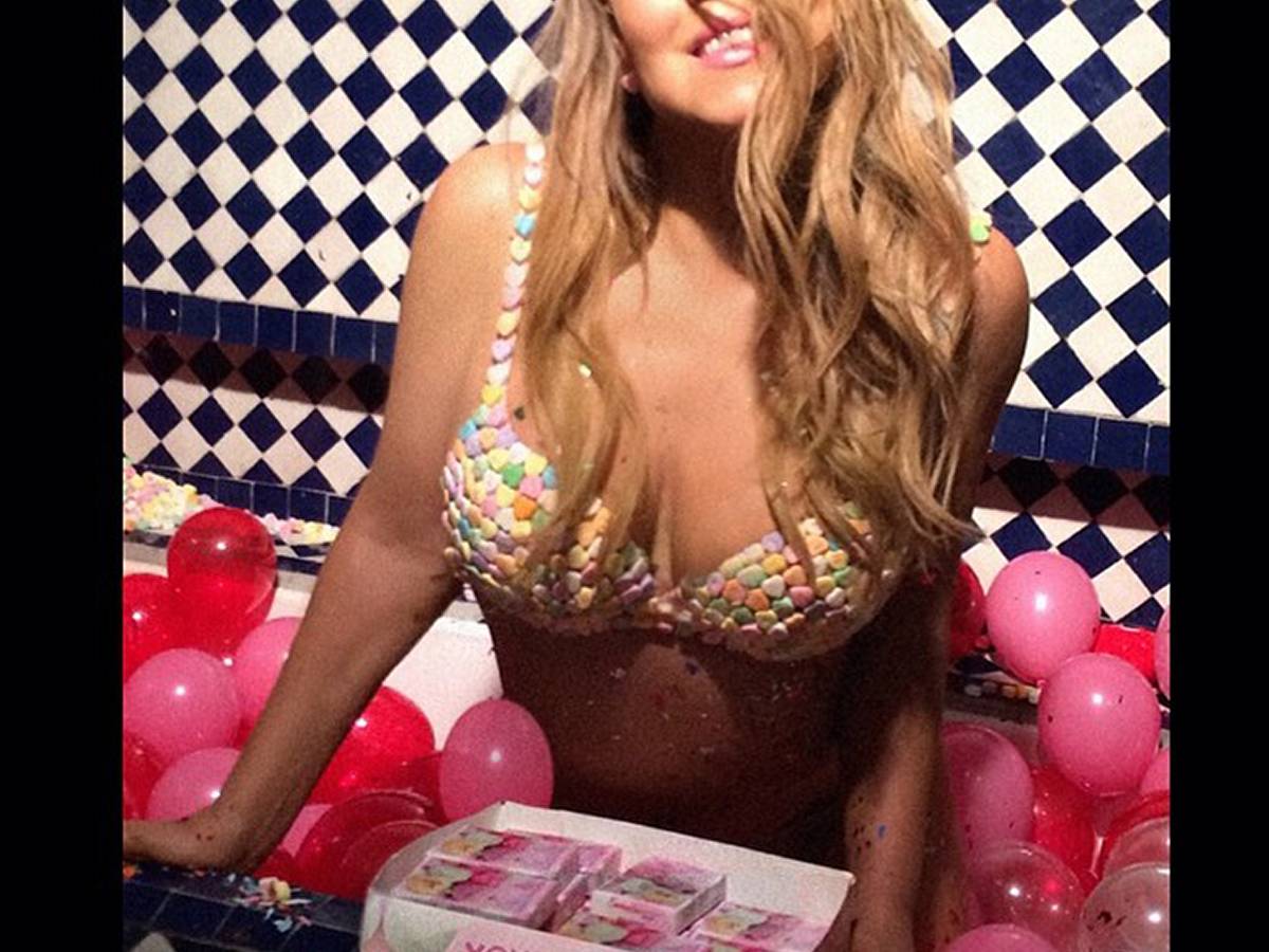 Mariah Carey Wears Candy Bra, Lounges in Bathtub in Valentine's Photos