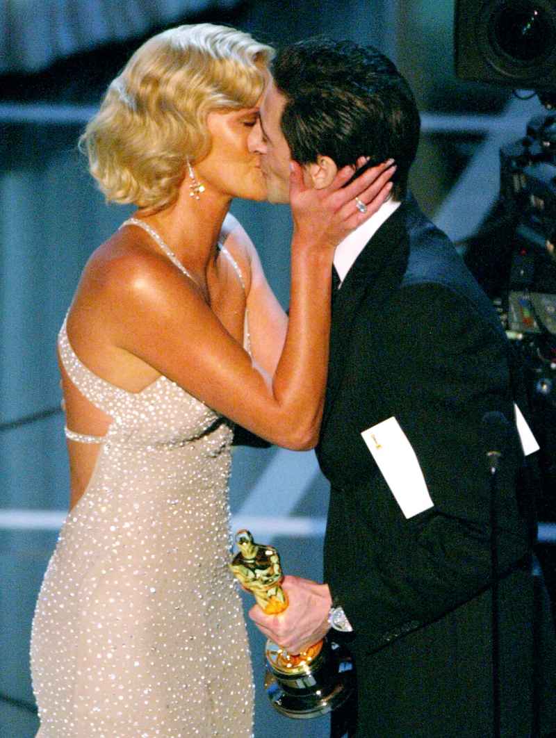 1393349040_charlize theron adrien brody zoom