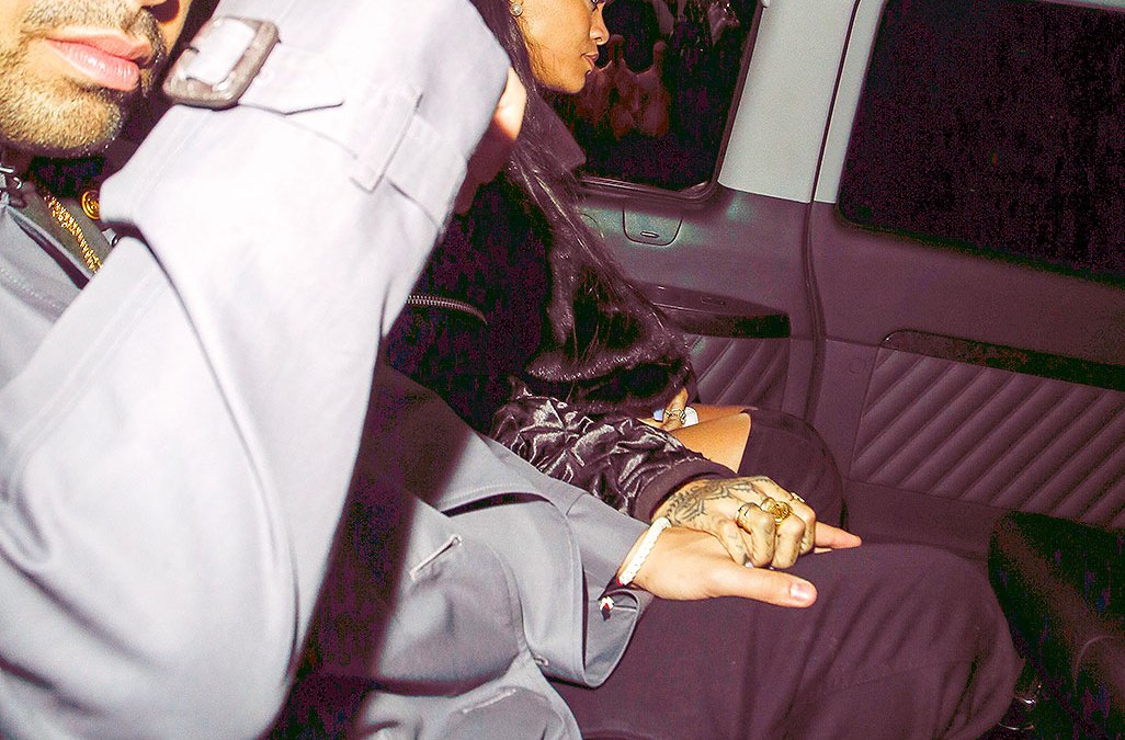 Rihanna and Drake hold hands in London