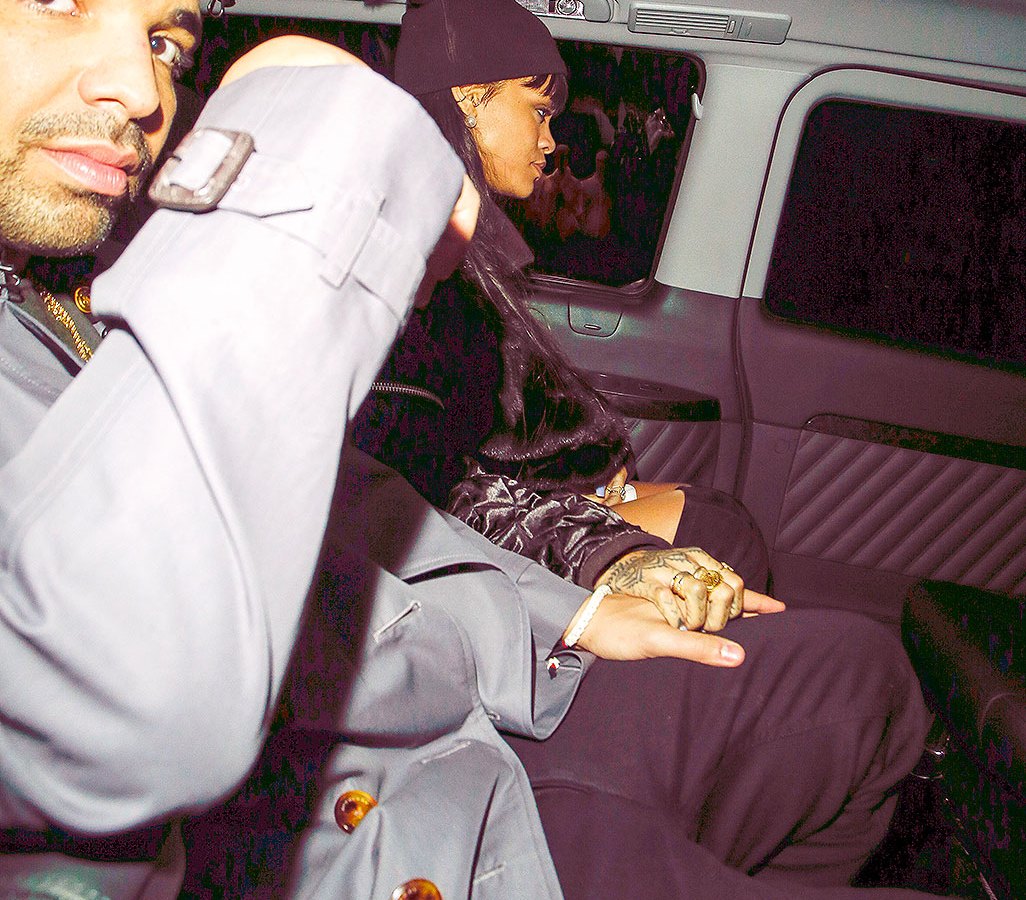 Rihanna and Drake hold hands in London