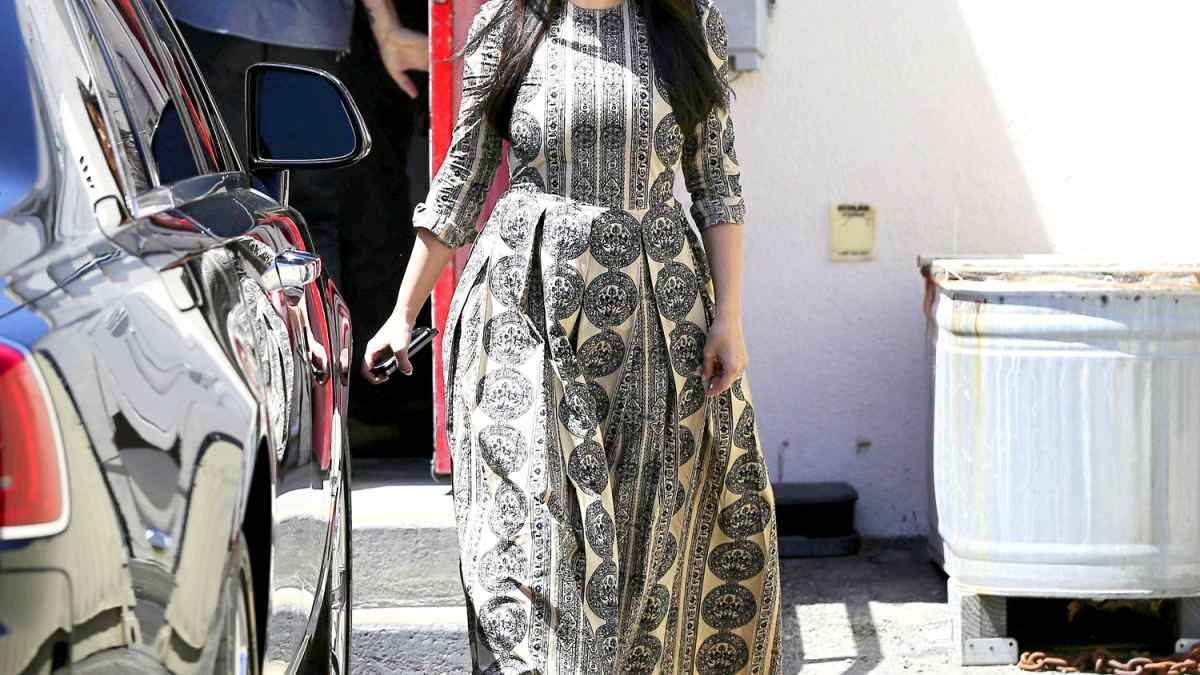 Kim Kardashian Covers Up in Maxi Dress After Europe Honeymoon | Us Weekly Kim Kardashian Covers Up in Maxi Dress After Europe Honeymoon | Us Weekly