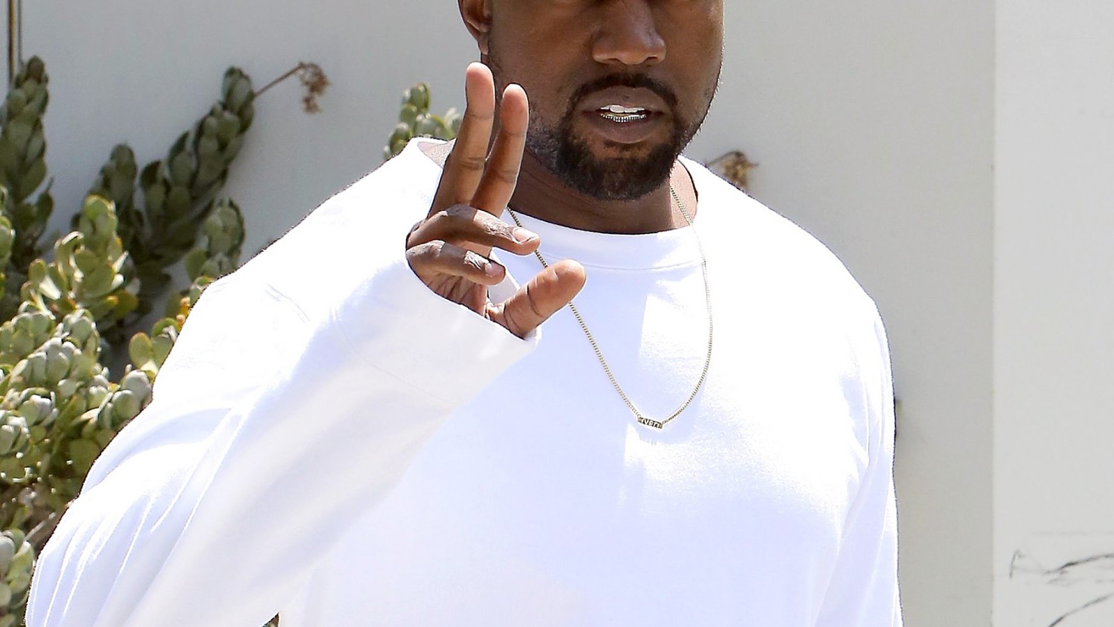 Kanye West wearing a Nori necklace on June 23, 2014