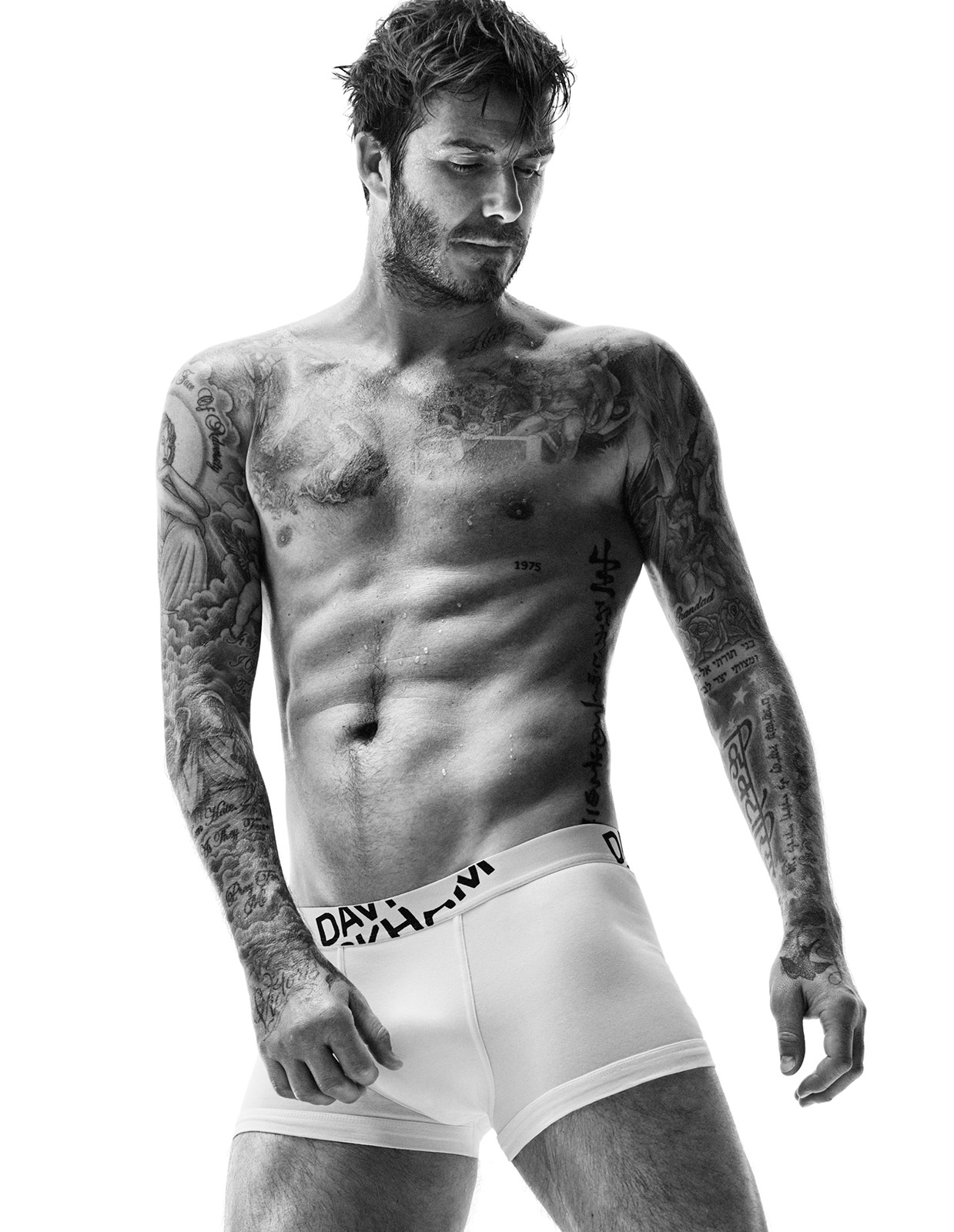 David Beckham Shows Off Buff Body in New H&M Ads - E! Online