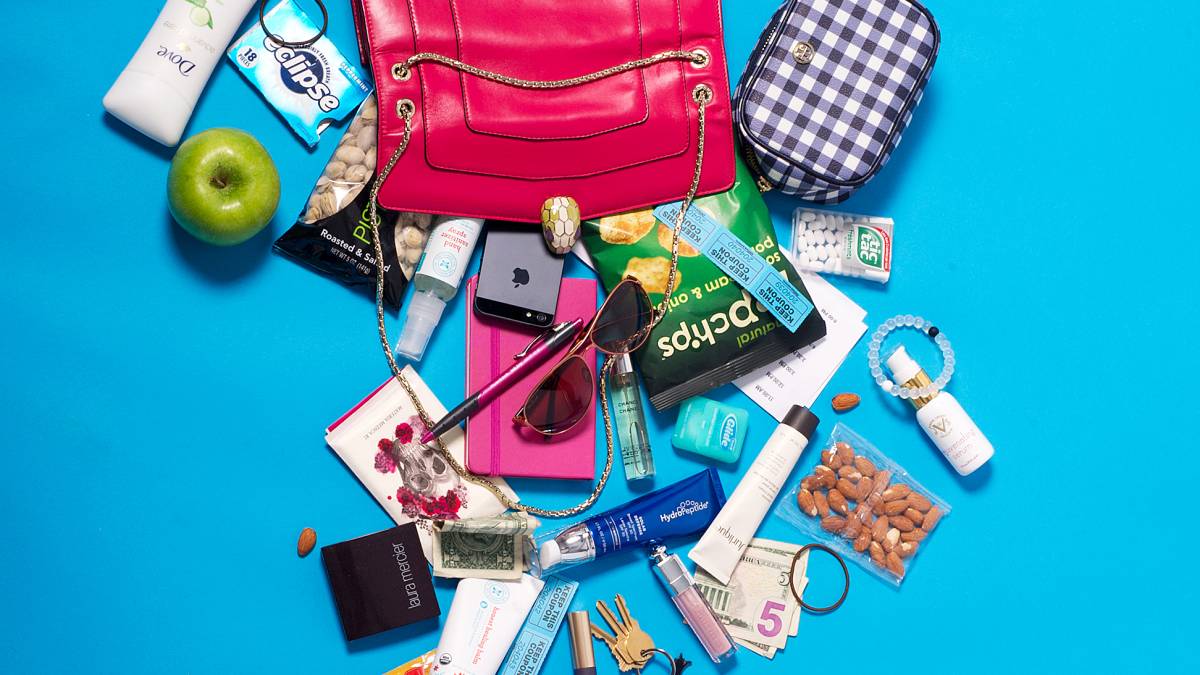 Ashley Greene pours out her satchel for Us Weekly.