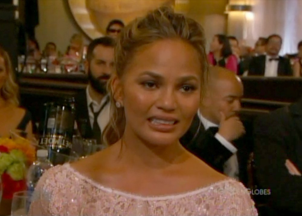 Chrissy Teigen reacting at Golden Globes 2015